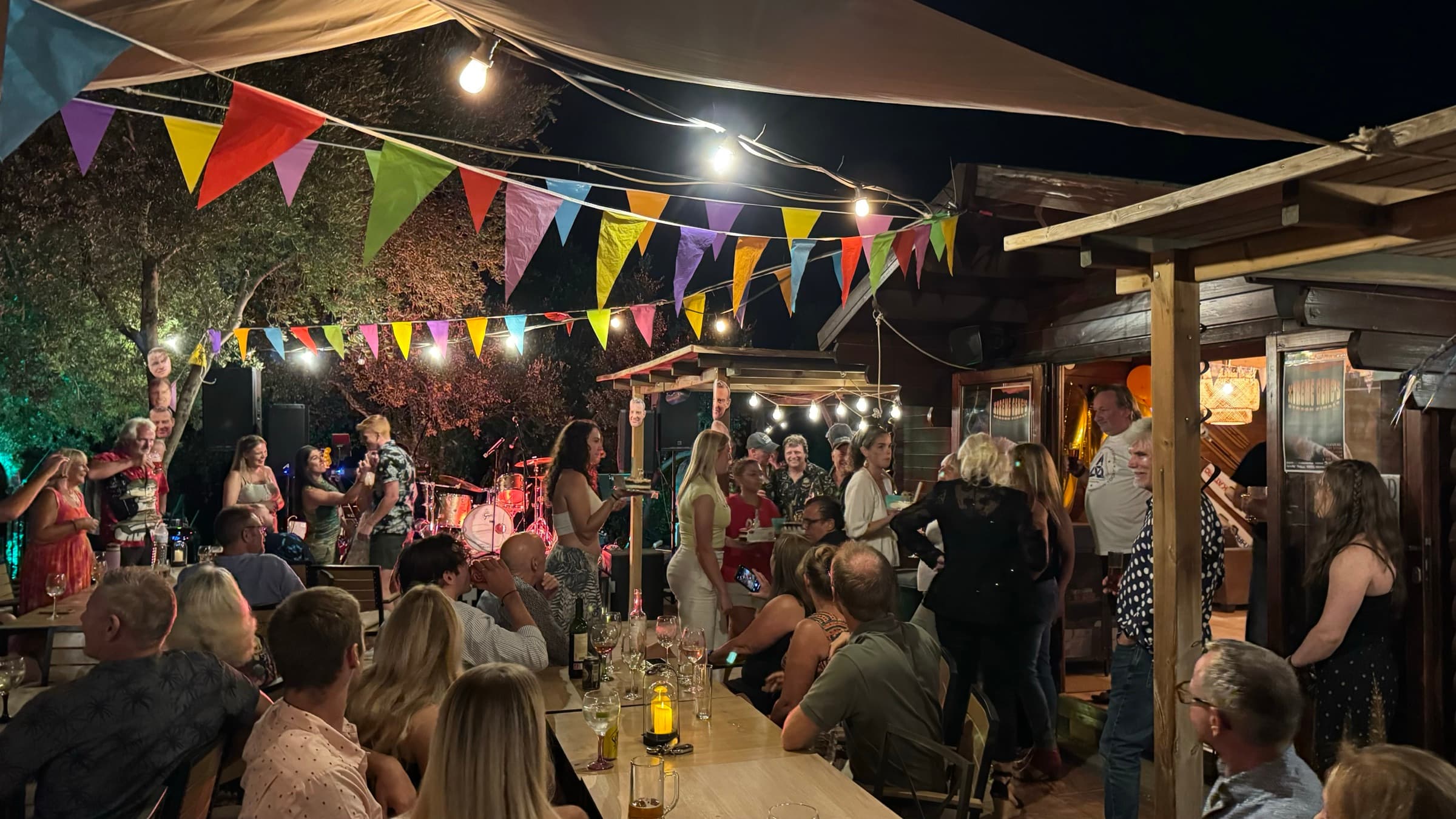 Guests enjoying a lively evening party on the Xtreme Gene terrace